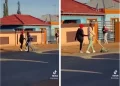 VIDEO: A guy and lady enjoys themselves on the streets with a childhood game