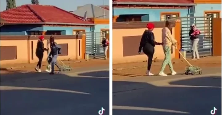 VIDEO: A guy and lady enjoys themselves on the streets with a childhood game