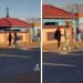 VIDEO: A guy and lady enjoys themselves on the streets with a childhood game