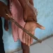 School principal in hot water for beating up students