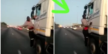 WATCH: Man caught on camera hanging from a moving truck on the highway. How did he get there?
