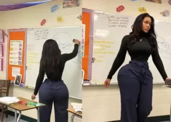 Pictures: Art teacher comes under fire for distracting students with her shape and back behind