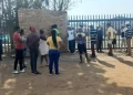 She dated a principal and it ended in tears, Angry community members block school gates