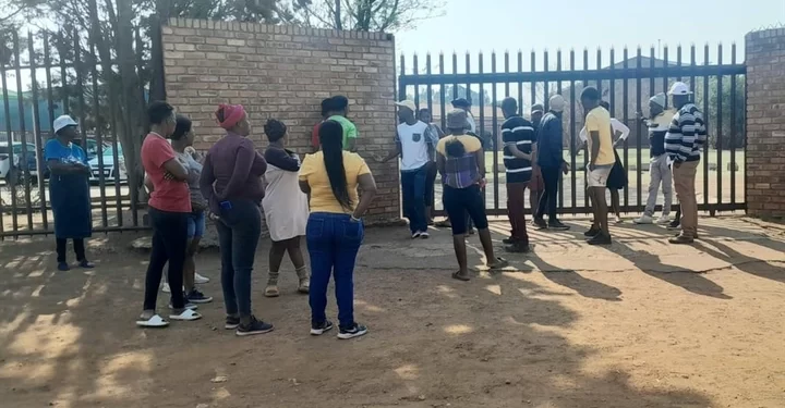 She dated a principal and it ended in tears, Angry community members block school gates