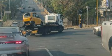 Watch: Taxi drivers and their patrol teams have gone on a rampage across JHB tipping over Bajaj Bolt-Go mini taxis