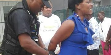 A woman was beaten by the community for killing her child and she was handed over to the police