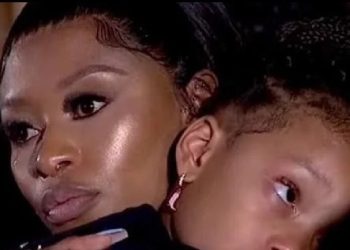 Dj Zinhle living in fear of her life? – after she was spotted with ” over 50″ bodyguards at a club.