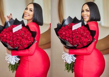 Brown Mbombo Delights Fans with Glamorous Red Outfit and Rose Bouquet
