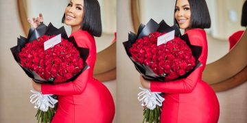Brown Mbombo Delights Fans with Glamorous Red Outfit and Rose Bouquet
