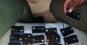 Man is arrested with a box full of bank cards