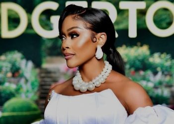 Thembi Seete’s Looks Stunning In An All White Dress At The Bridgertons3 Party