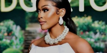 Thembi Seete’s Looks Stunning In An All White Dress At The Bridgertons3 Party