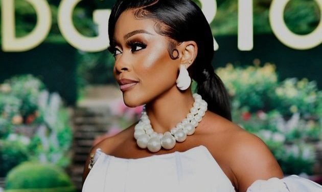 Thembi Seete’s Looks Stunning In An All White Dress At The Bridgertons3 Party