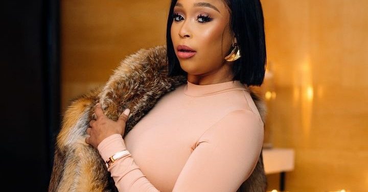 Social Media Abuzz After Minnie Dlamini’s Winter Fur And Jumpsuit Post