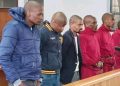 These Men are Accused of Killing 18 People and Carrying AK-47s