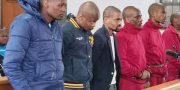 These Men are Accused of Killing 18 People and Carrying AK-47s