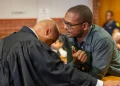 Fadiel Adams faces fraud charges and remains in custody ahead of court appearance