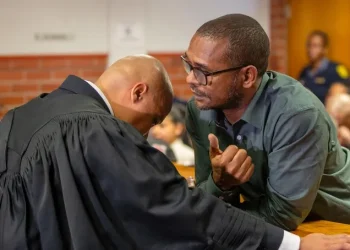Fadiel Adams faces fraud charges and remains in custody ahead of court appearance